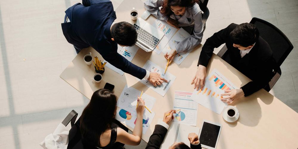 Marketing Analysis Accounting Team Teamwork Business Meeting Concept. Top view in office while people having a meeting